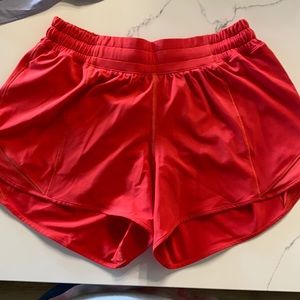 Lululemon Hotty Hot LR  short 4” lined. Has zippered side pocket, like new Red